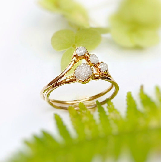 Raw diamond chevron wedding ring set with ethically sourced uncut diamonds and 18k gold bands.