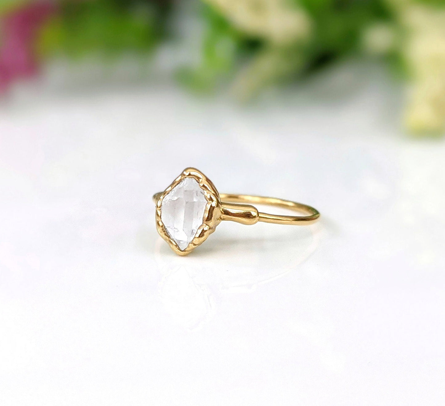 Herkimer diamond chevron engagement ring set in gold, featuring a unique stone, perfect for an April birthstone gift.