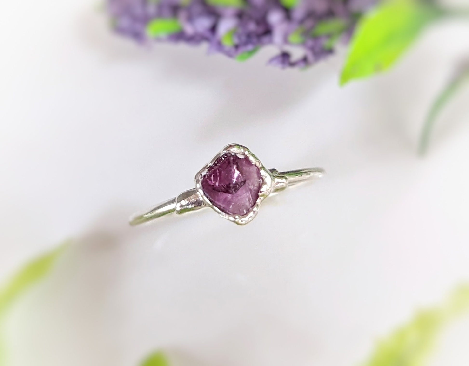 Raw Alexandrite silver ring on a delicate band, perfect for June birthdays or as a heartfelt gift.