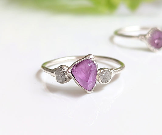Raw Alexandrite and diamond silver ring with unique handcrafted design, symbolizing love and commitment.