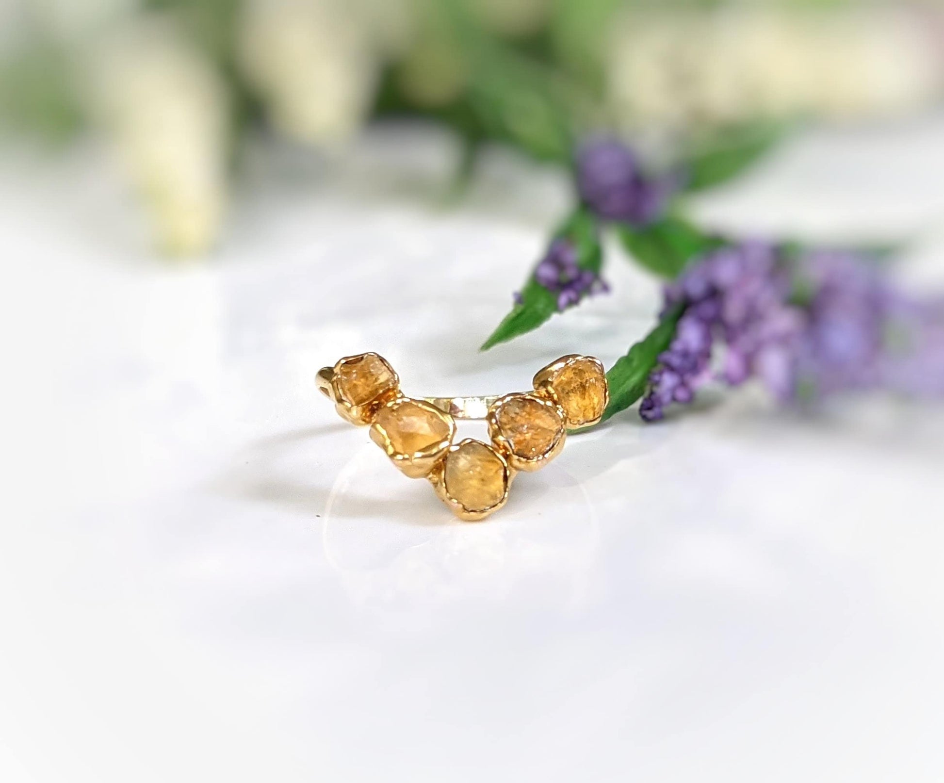 Raw Topaz and Citrine Chevron ring set with five natural Citrine stones on an 18k Gold band.