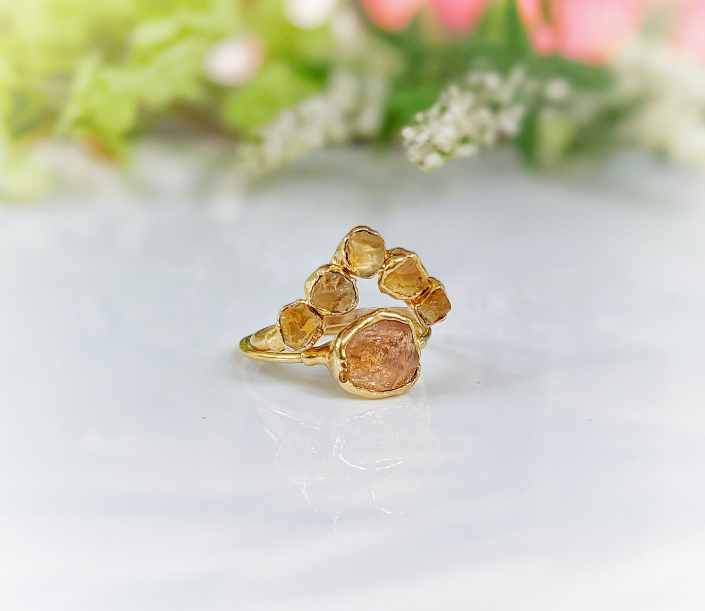Raw Topaz and Citrine Chevron ring set in 18k gold, featuring five raw Citrine stones for a unique wedding ring.