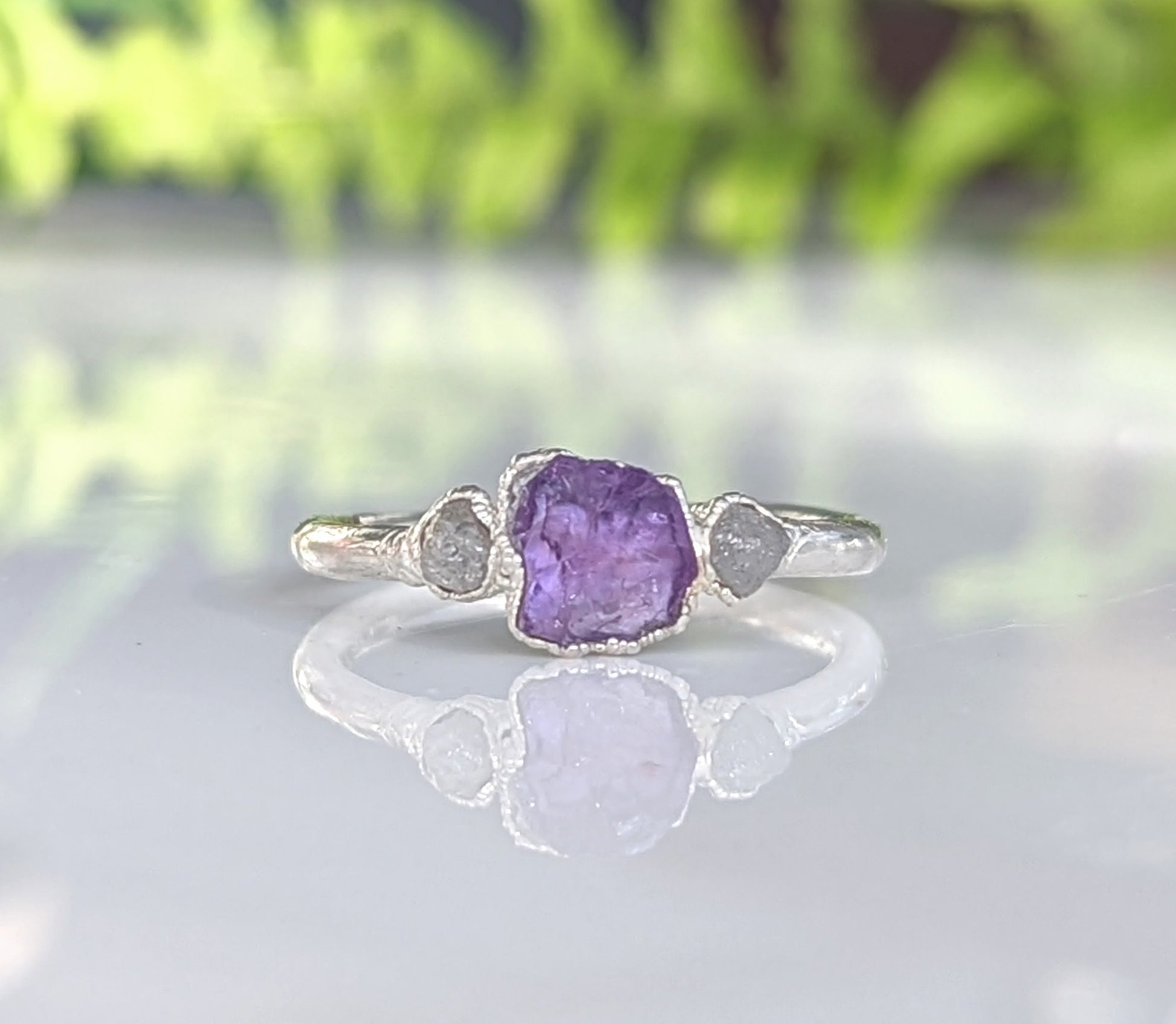 Raw Amethyst and rough diamond ring on sterling silver band, perfect for February birthdays or special occasions.