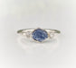 Raw sapphire and rough diamond ring, showcasing unique rustic beauty and ethical craftsmanship.