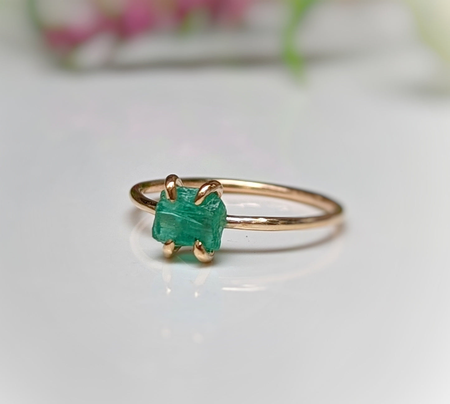 Raw emerald solitaire ring in solid 14k gold, handcrafted, elegant, unique engagement ring for Valentine's Day.