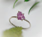 Handcrafted raw Alexandrite ring in sterling silver, featuring a unique, sparkling June birthstone.