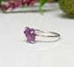 Raw Alexandrite ring in sterling silver, unique handmade engagement ring featuring a stunning purple gemstone.