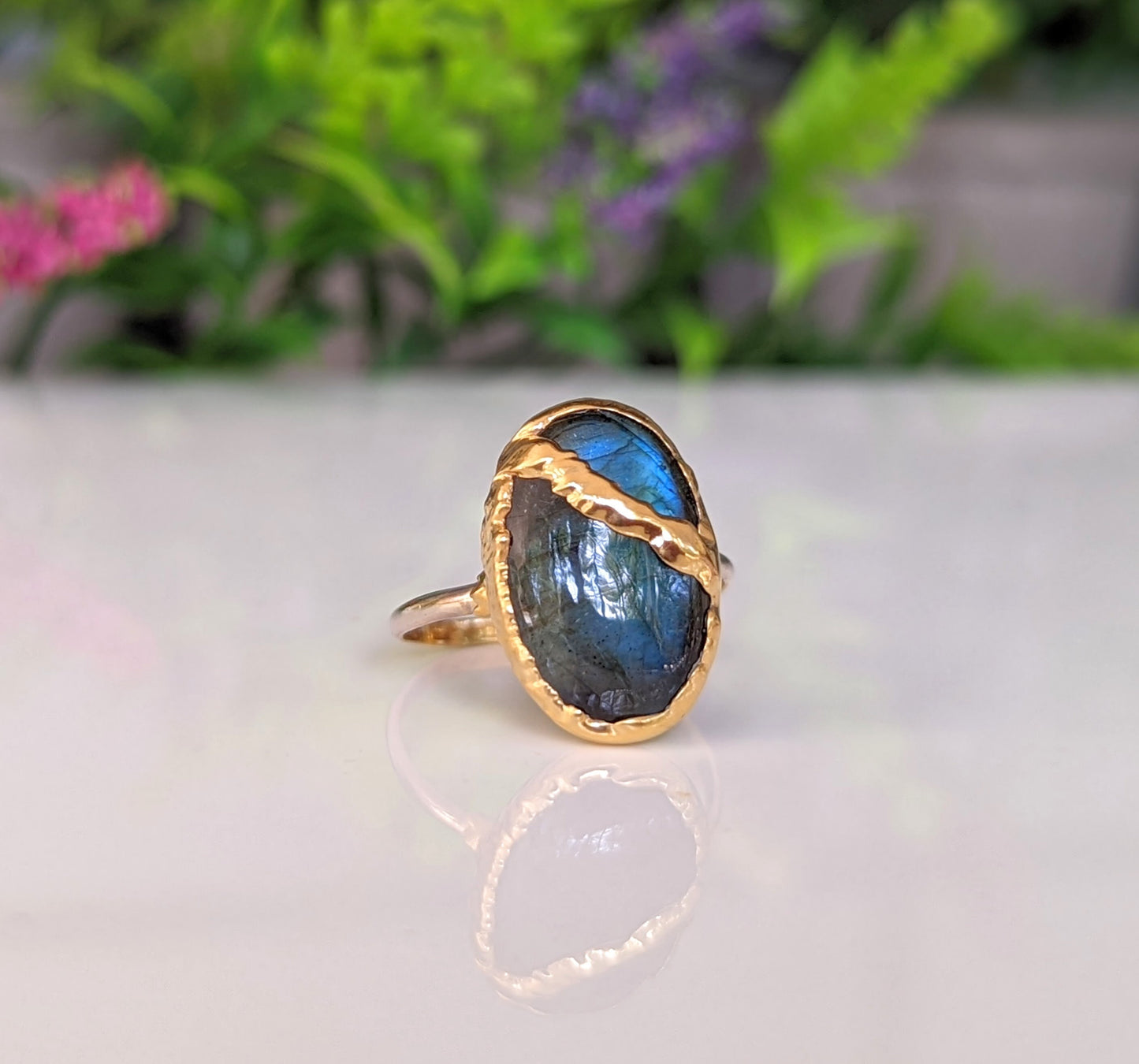 Labradorite Kintsugi ring featuring a stunning blue stone set in 18k gold-plated electroformed band.