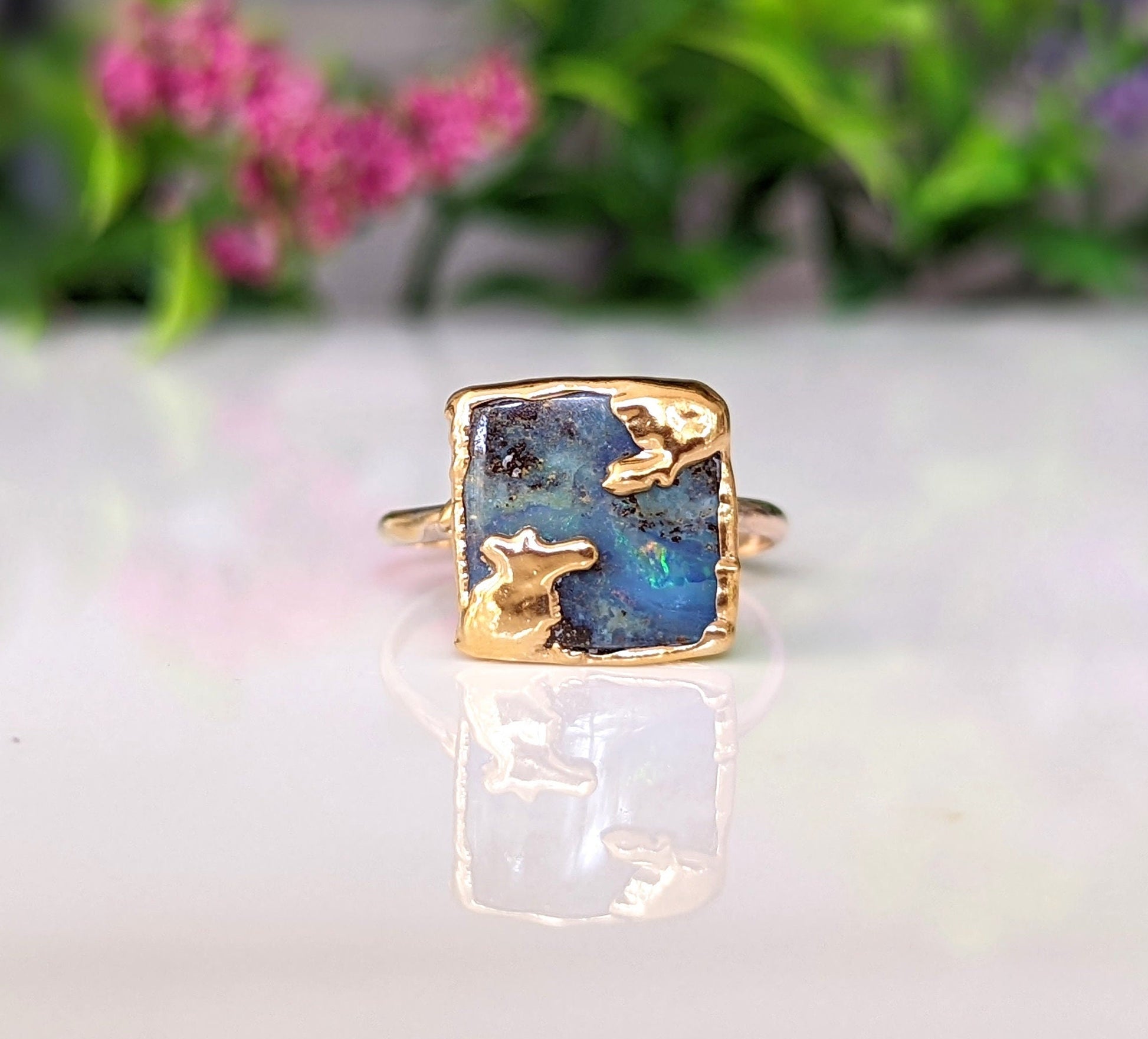 Australian Opal Kintsugi ring with gold detailing on a 14k gold-filled band, showcasing unique imperfections.