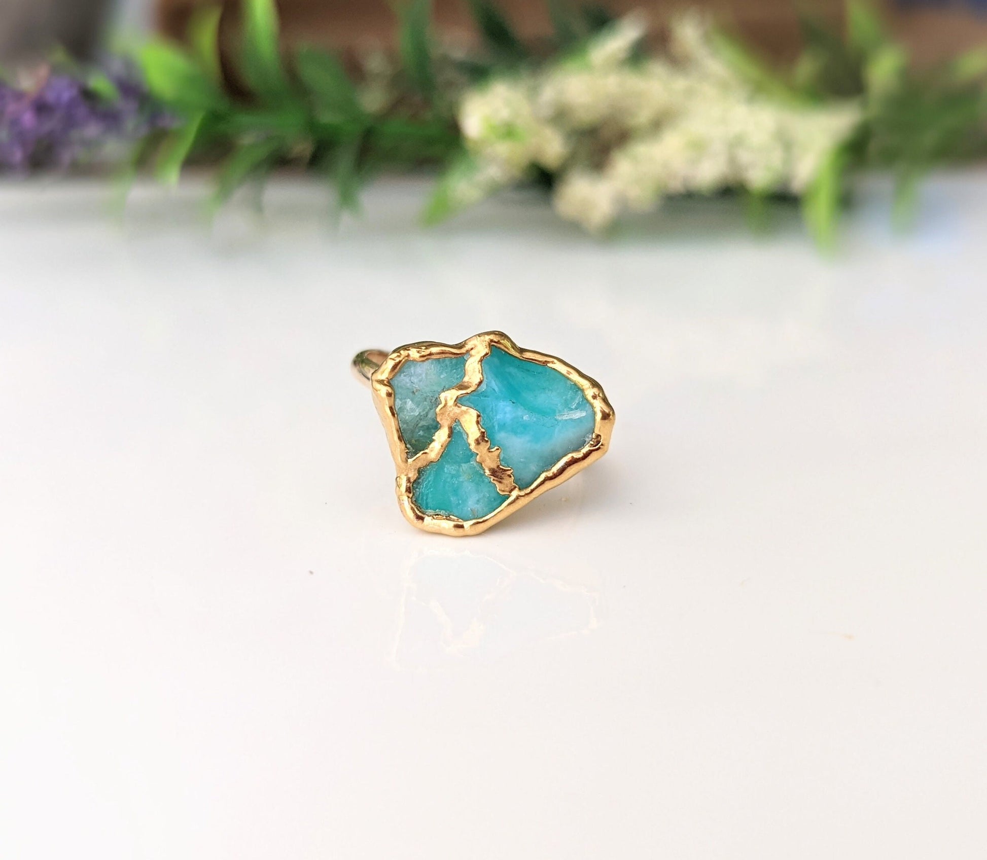 Raw Peruvian Opal Kintsugi ring featuring aqua blue opal with gold electroforming on a 14k Gold filled band.