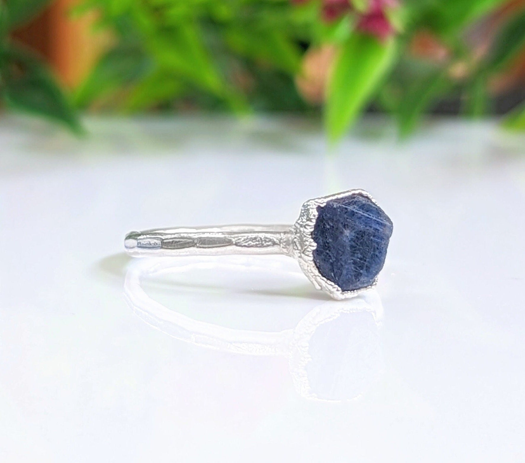 Raw blue Sapphire ring on a handcrafted Sterling Silver band, ideal for gifts or special occasions.