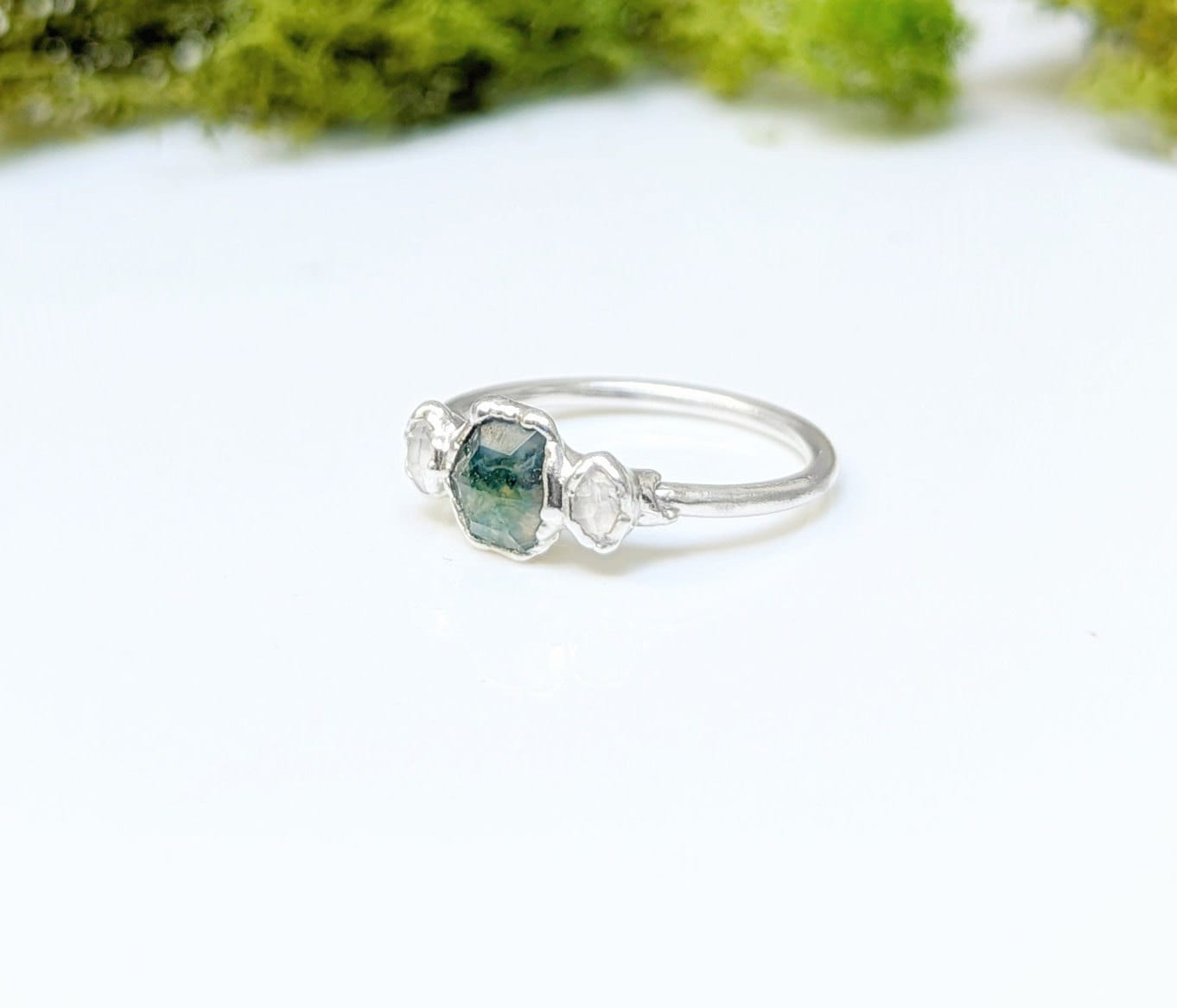 Moss Agate and Herkimer diamond engagement ring in silver, showcasing unique rustic beauty.