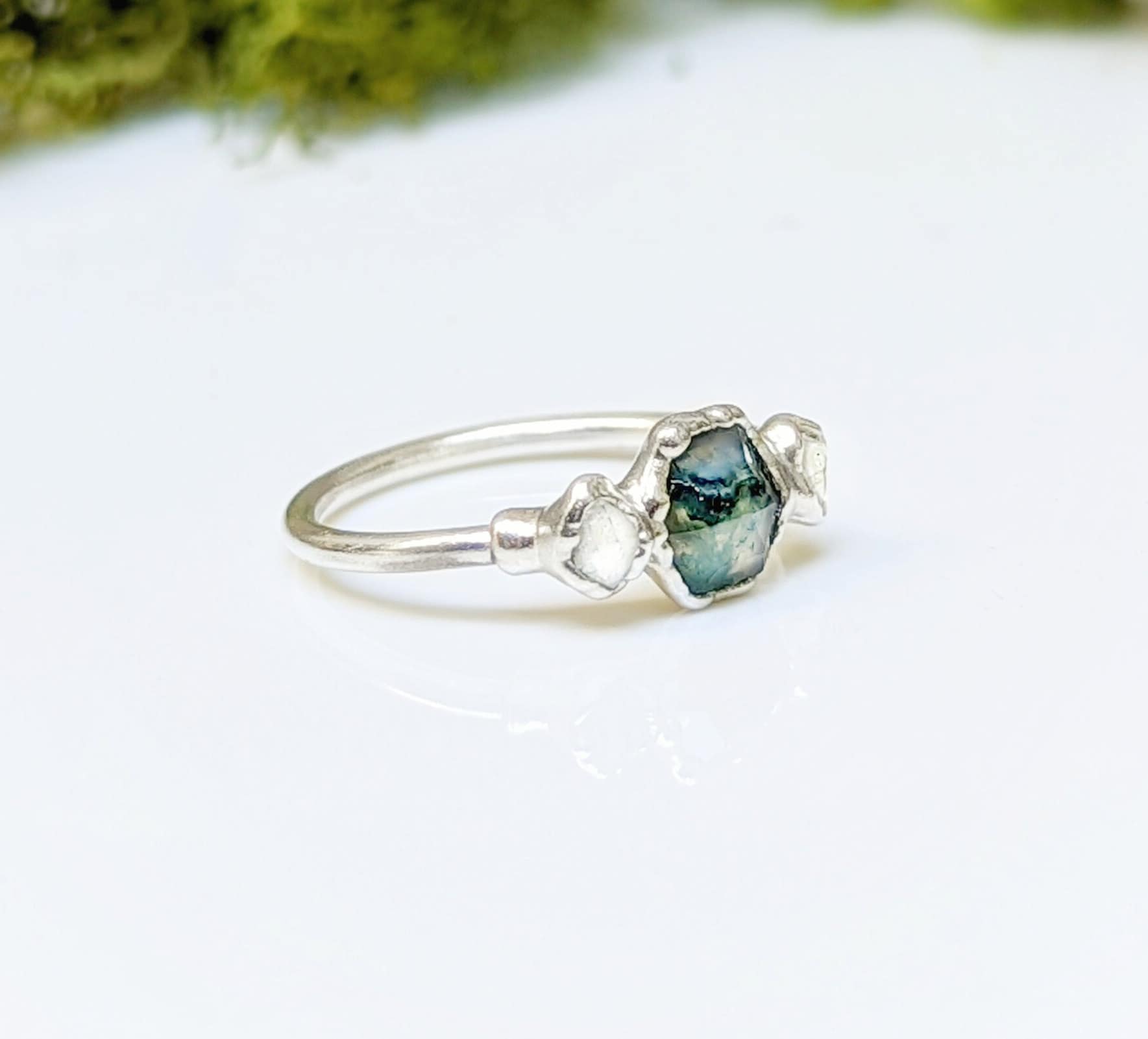 Moss Agate and Herkimer diamond engagement ring in silver, featuring a hexagon Moss Agate and two raw Herkimer diamonds.