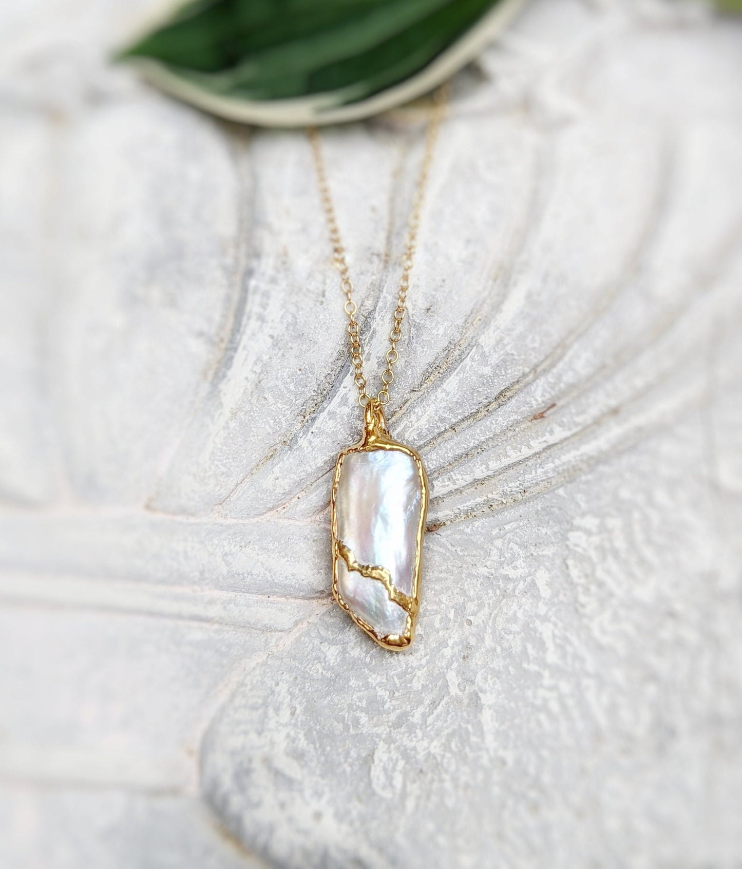 Oblong Keshi Pearl Kintsugi necklace in 18k gold plating on a 14k gold filled chain, perfect gift for special occasions.