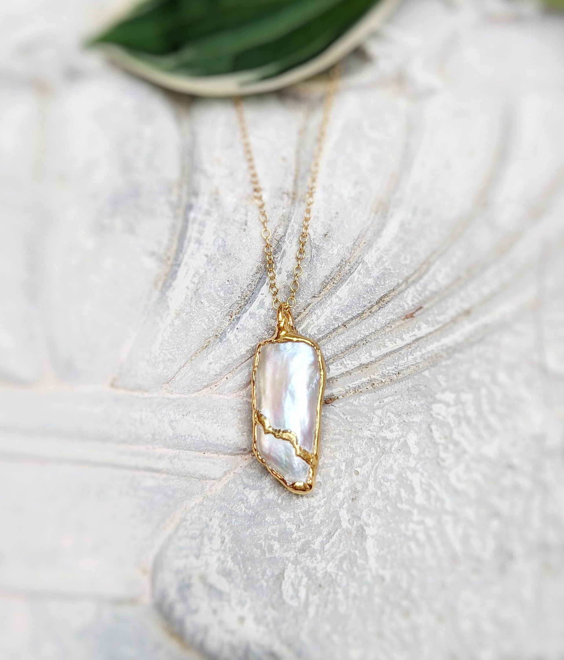 Oblong Keshi Pearl Kintsugi necklace in 18k gold plating on a 14k gold filled chain, perfect gift for special occasions.