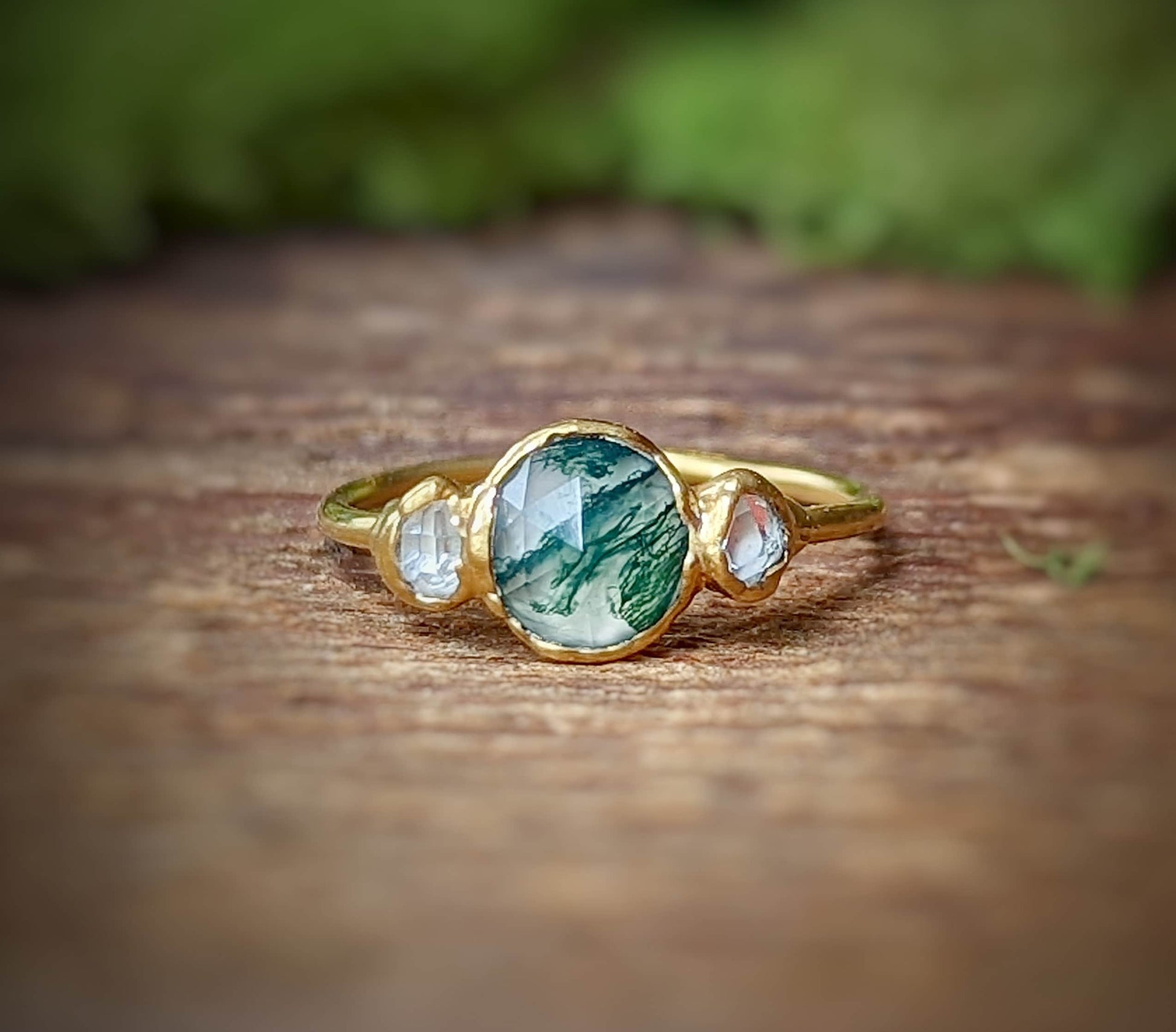 Moss Agate and Herkimer diamond engagement ring crafted in gold, showcasing unique natural beauty.
