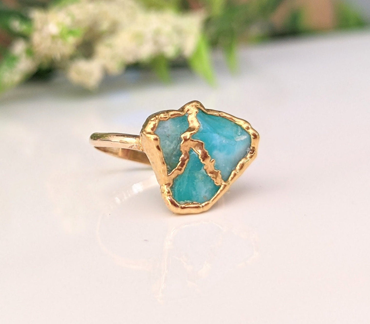 Aqua blue raw Peruvian Opal Kintsugi ring on a 14k gold filled band, elegantly crafted and unique.