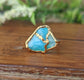 Raw Peruvian Opal Kintsugi ring, aqua blue gemstone set in gold, unique handcrafted jewelry.