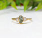 Raw green sapphire and diamond engagement ring handcrafted in 14k gold, perfect for promises or special gifts.