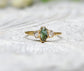 Handcrafted raw green Sapphire and Herkimer diamond engagement ring in 14k gold, perfect for promises and special gifts.