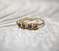 Raw sapphire multi-stone ring on a solid 14k gold filled band, featuring unique handcrafted design.