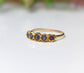 Handcrafted raw Sapphire multi-stone ring on a solid 14k Gold filled band, showcasing blue sapphires.