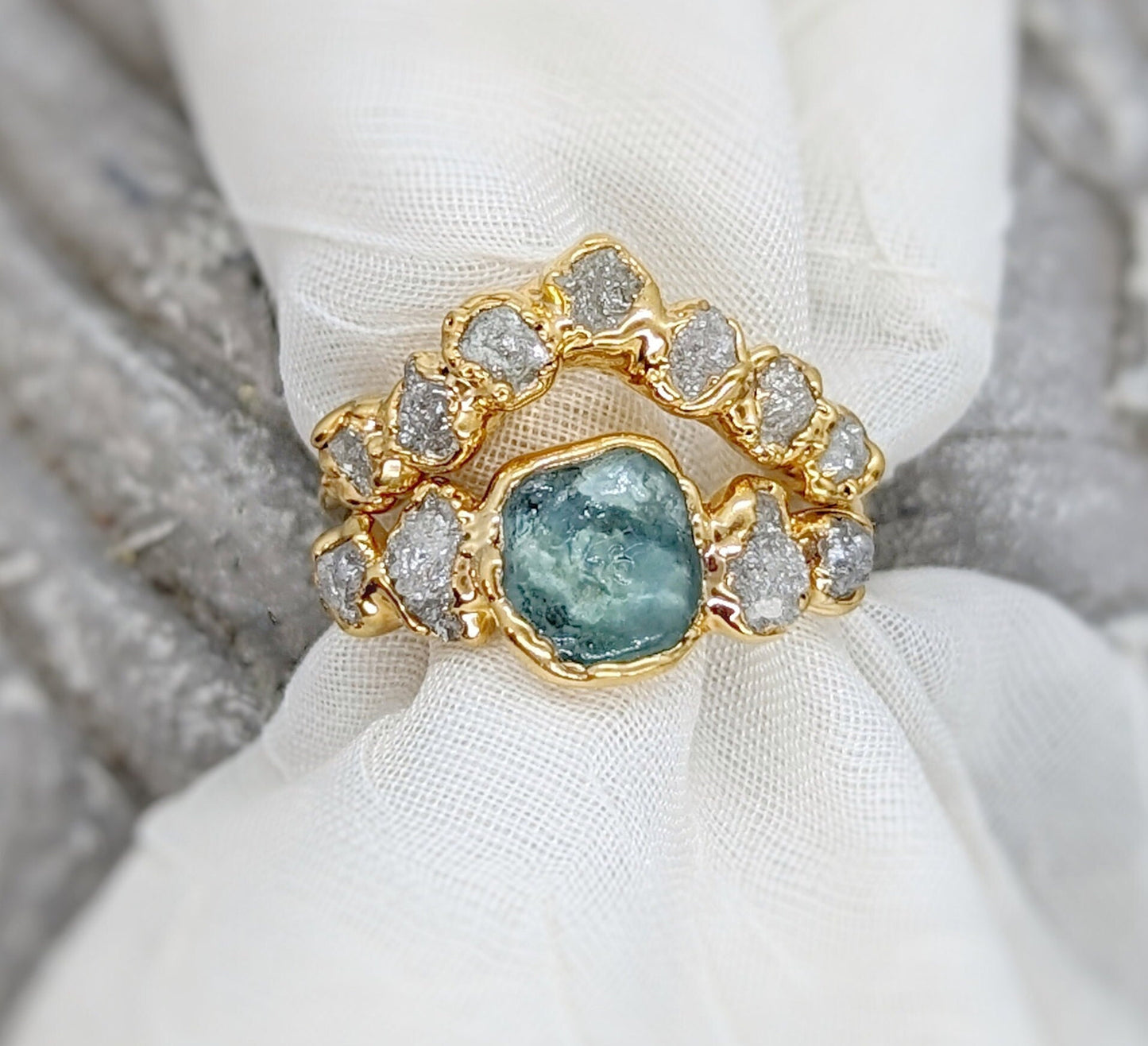 Raw Montana Sapphire and diamond wedding ring set on solid 14k gold, handcrafted unique design.