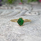 Handcrafted raw green Garnet ring set in gold, showcasing its unique natural beauty and earthy charm.