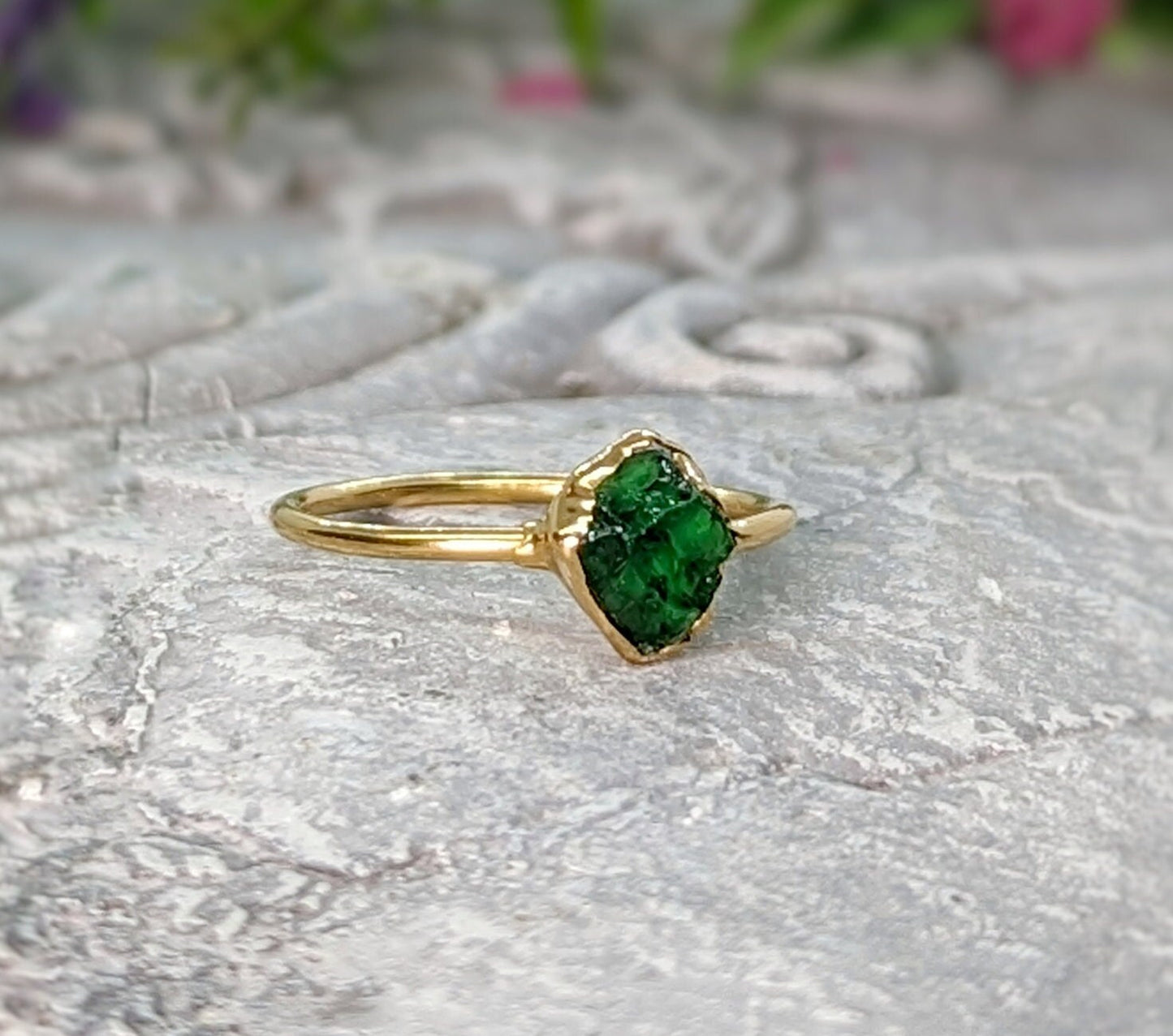 Raw green Garnet ring handcrafted in gold, showcasing a natural uncut crystal with earthy edges.