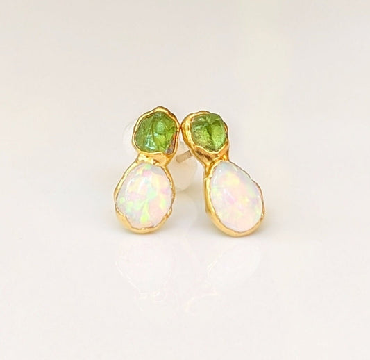 Dainty raw Peridot and Opal stud earrings, uniquely handcrafted with a rustic yet elegant design.