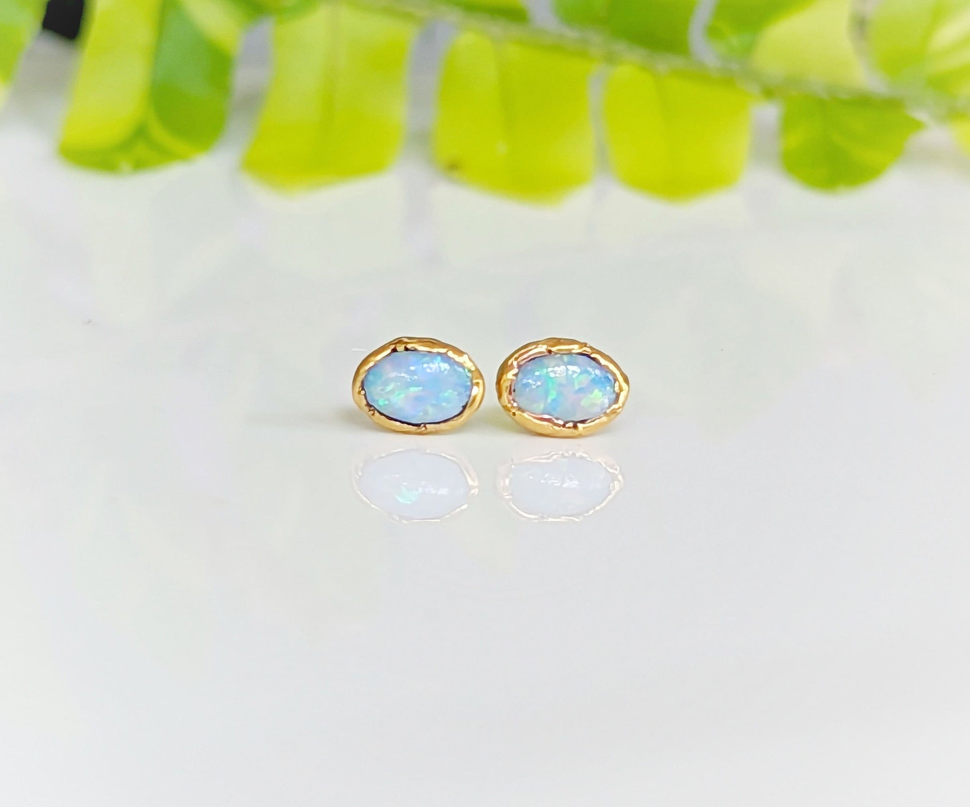 Light blue Australian Opal stud earrings on 14k gold filled posts, perfect bridal and gift choice.