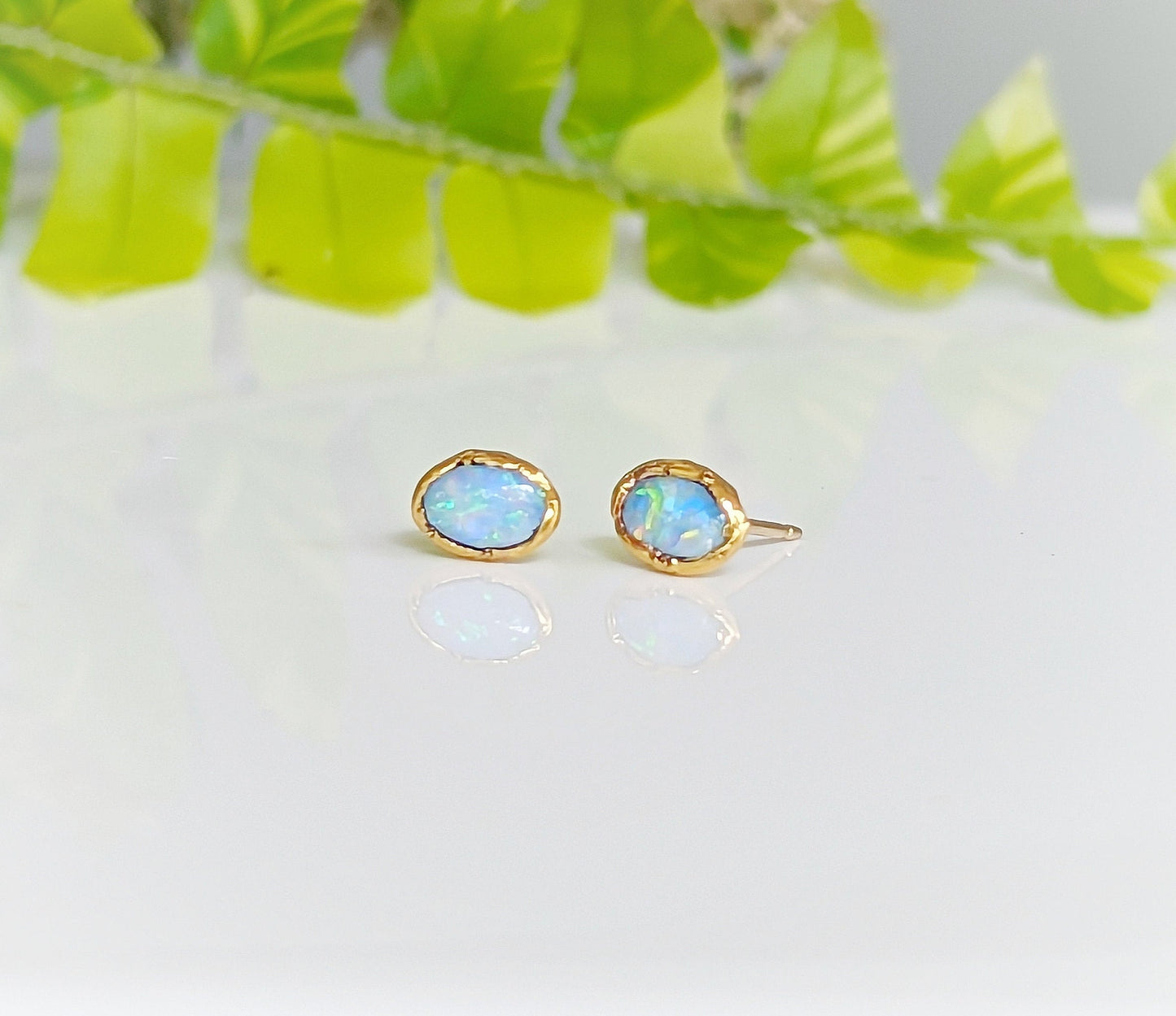 Light blue Australian Opal stud earrings on 14k gold filled posts, perfect for brides and special gifts.