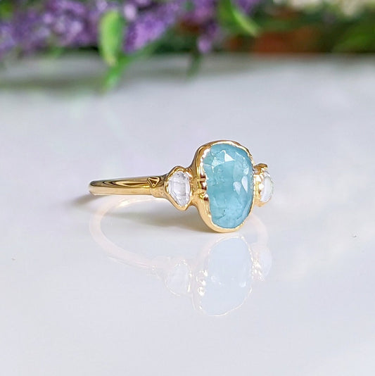 Aqua blue Grandidierite and diamond ring in 18k gold, handcrafted with a rose cut stone and Herkimer diamonds.