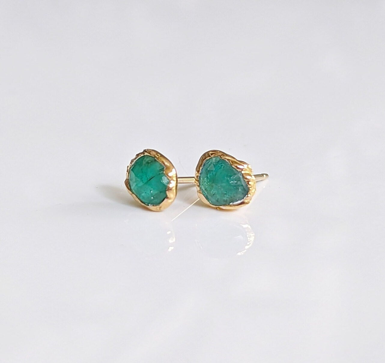Natural emerald stud earrings in 18k gold, featuring rose cut faceted emeralds, perfect for gifts and bridal wear.