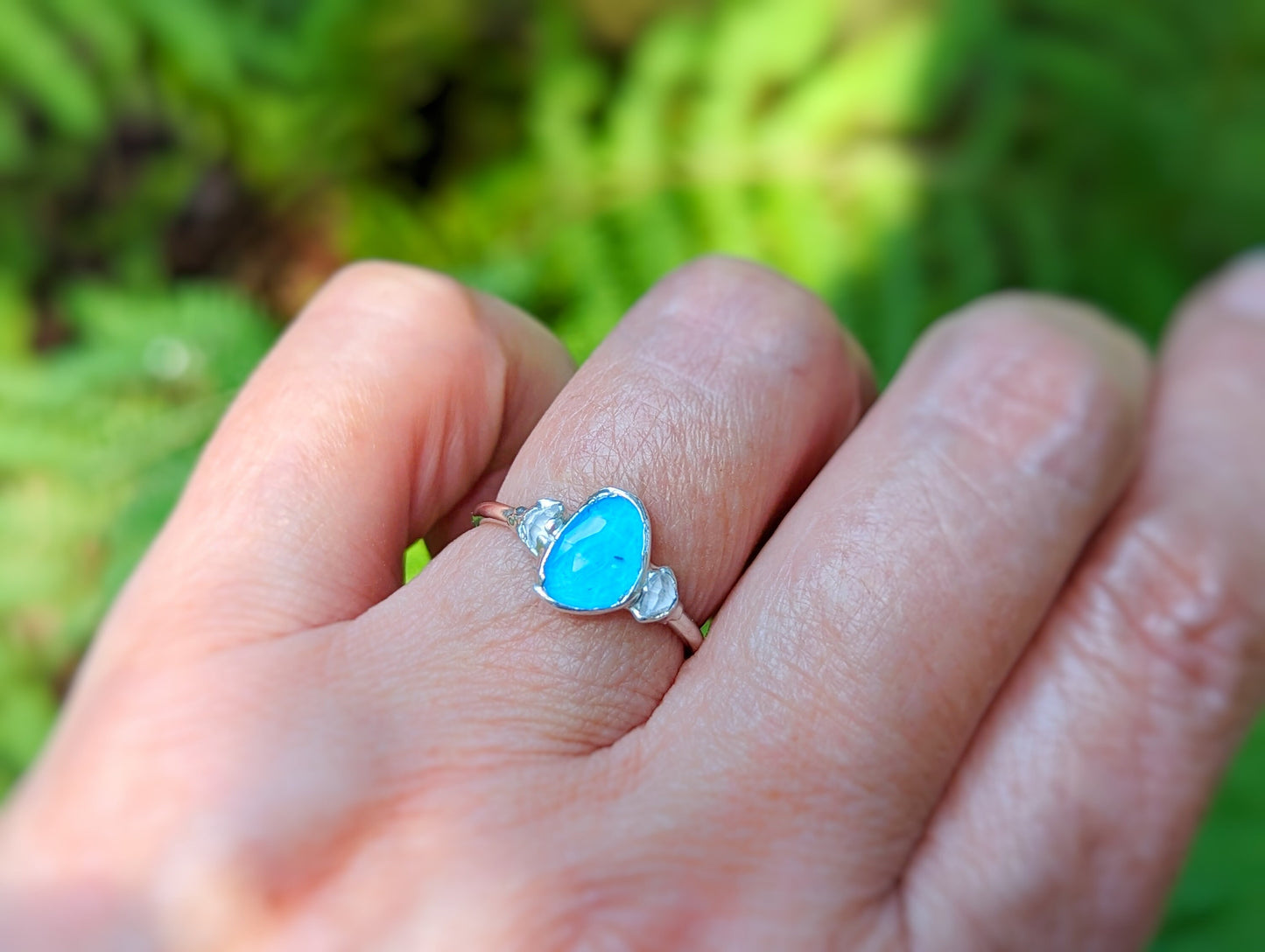Blue Topaz and Herkimer diamond engagement ring in Sterling Silver, showcasing elegance and beauty.