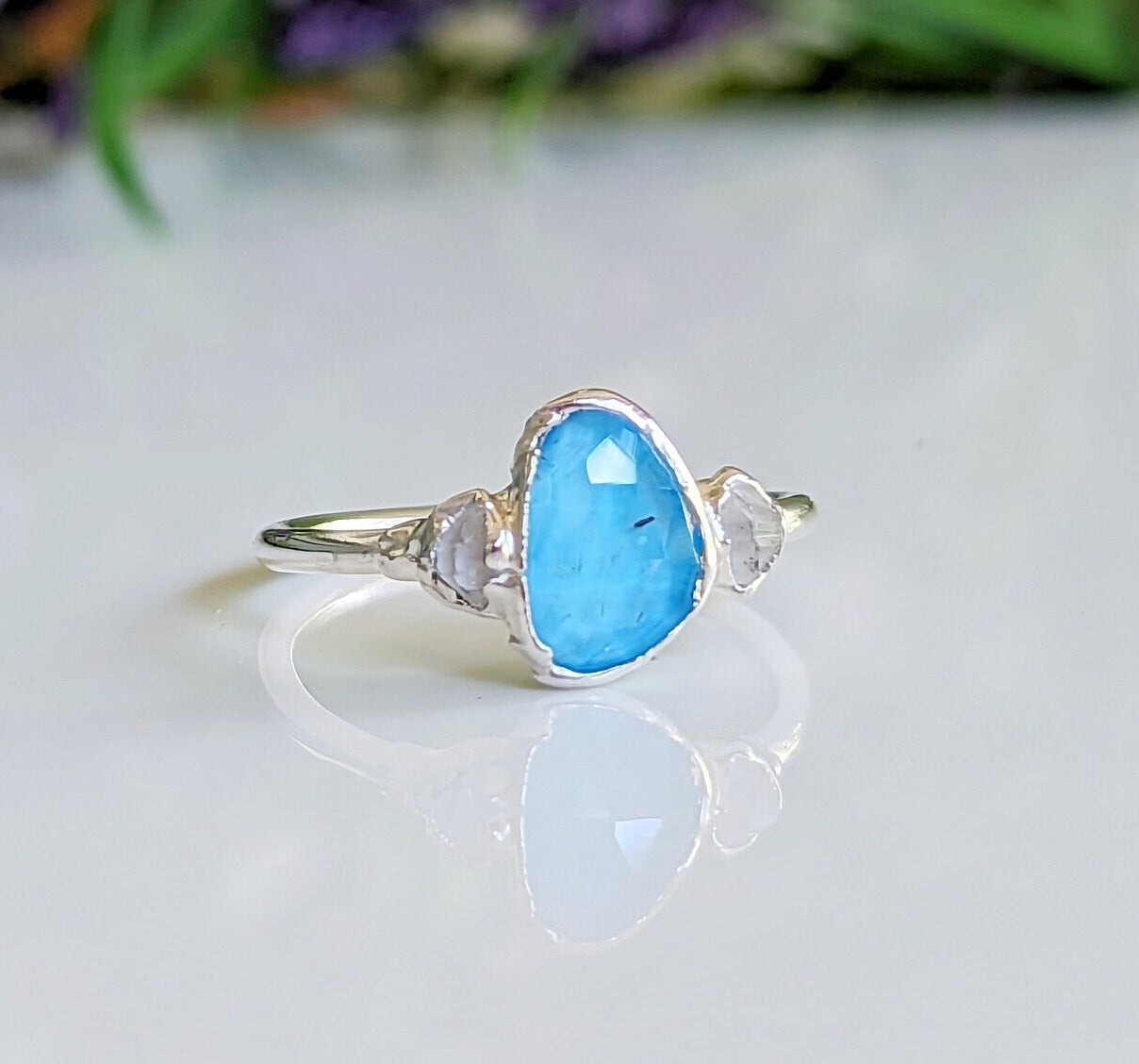 Blue Topaz and Herkimer diamond engagement ring in sterling silver, showcasing unique design and sparkling gems.