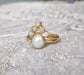 Freshwater pearl and raw diamond chevron wedding ring set in solid 14k gold, elegant and alternative bridal jewelry.