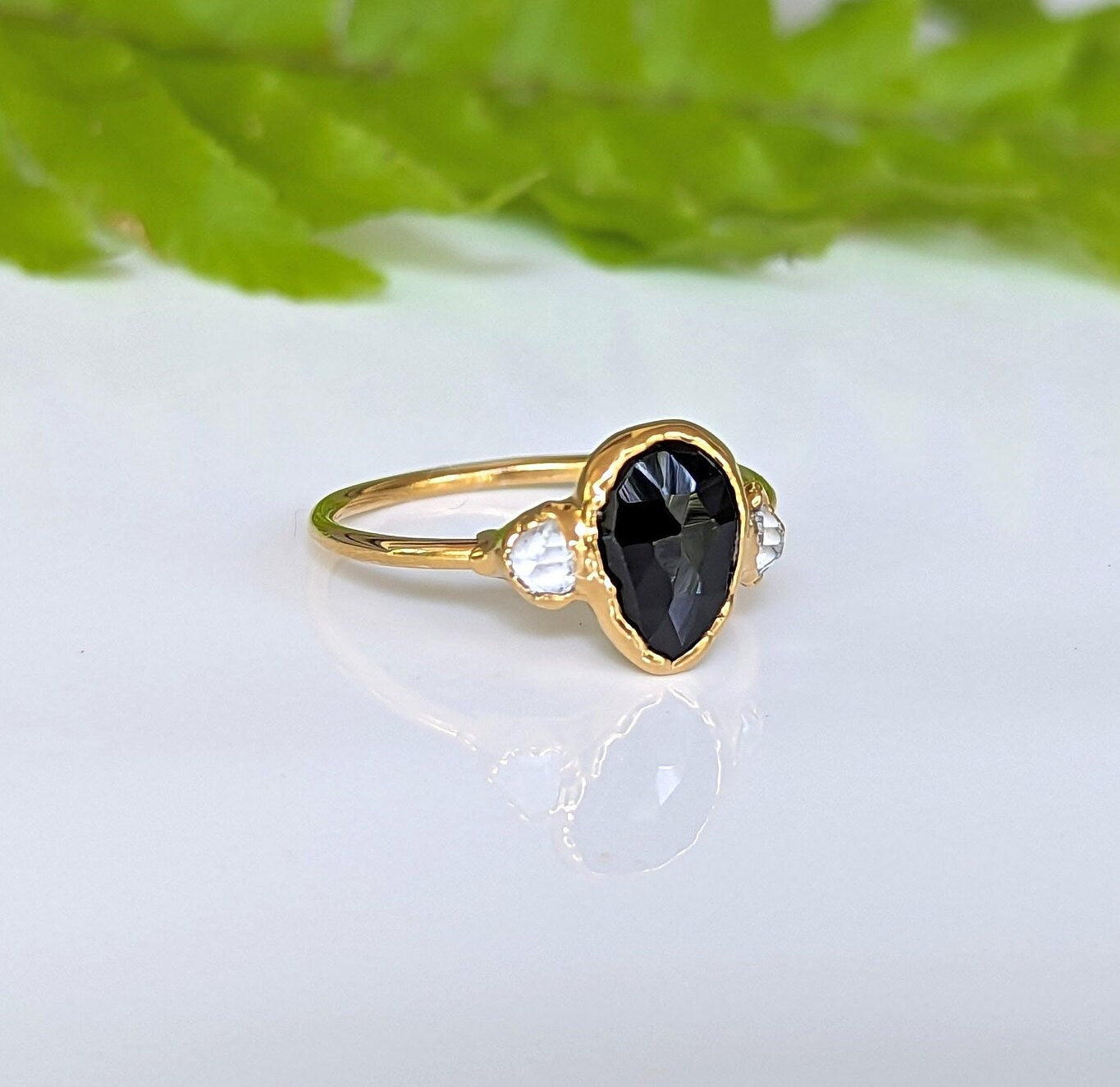 Black Spinel and Herkimer diamond engagement ring in solid 14k gold, handcrafted unique design.