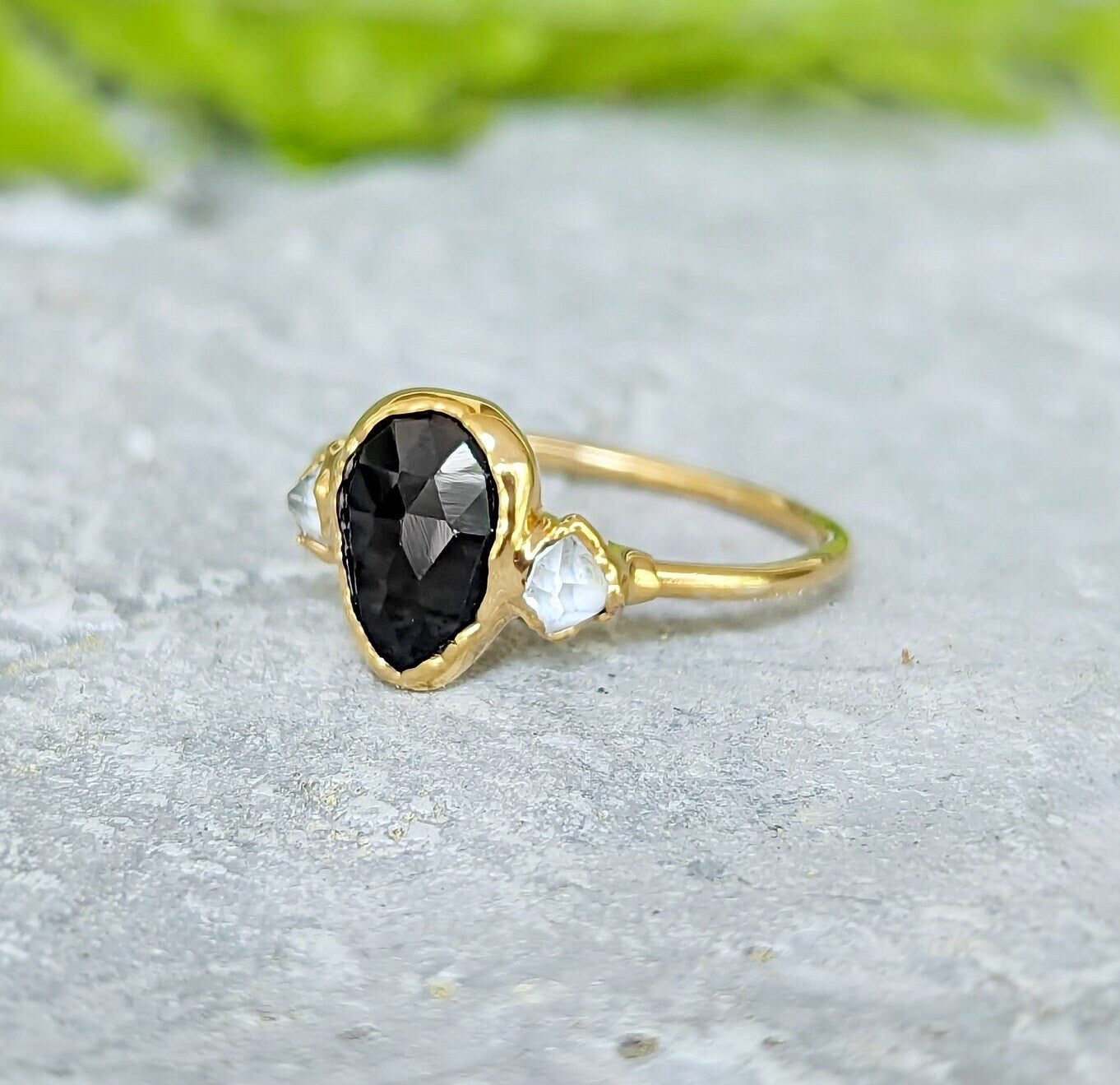 Black Spinel and Herkimer diamond engagement ring in solid 18k gold, showcasing dark elegance and unique craftsmanship.