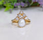 Freshwater pearl and raw diamond chevron wedding ring set in solid 14k gold, perfect for alternative bridal jewelry.