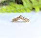 Raw diamond wedding ring set in solid 18k gold, featuring five unique raw diamonds for a stunning bridal look.