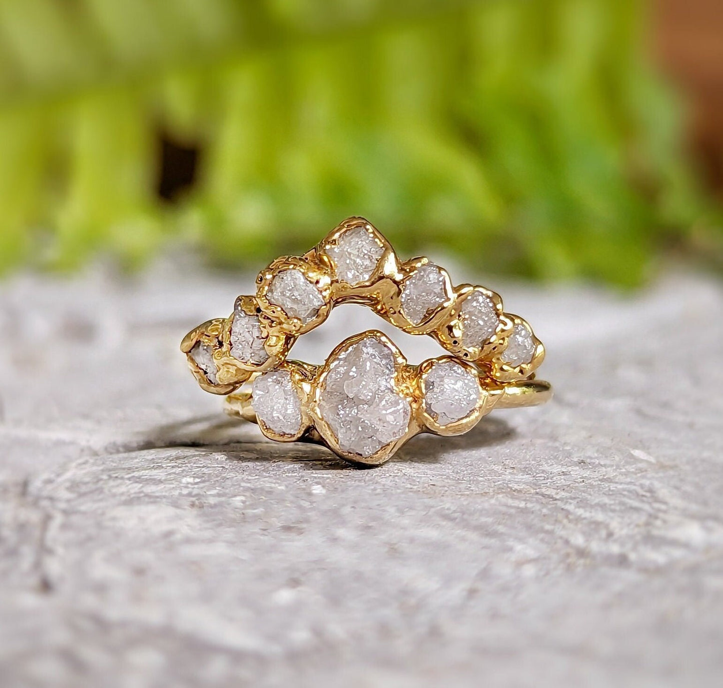 Raw diamond wedding ring set in solid 18k gold, featuring unique, natural diamonds for an elegant bridal look.