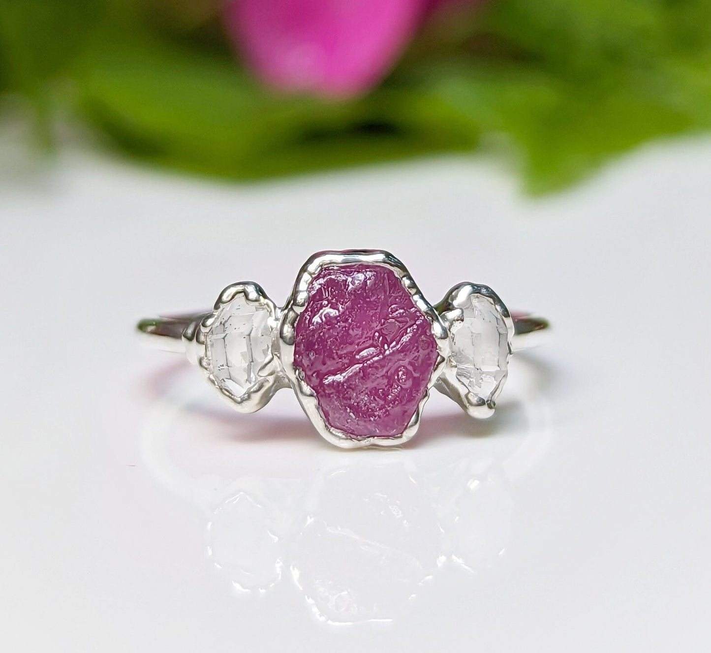 Dainty raw pink Sapphire and Herkimer diamond engagement ring on a Sterling Silver band.