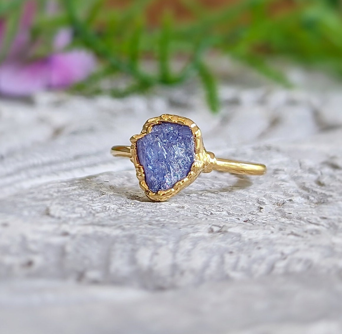 Raw Tanzanite ring in 14k gold, featuring a unique purple crystal, perfect for gifts and special occasions.