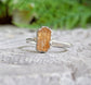 Raw Golden Imperial Topaz ring on sterling silver band, handcrafted for unique gifts and special occasions.
