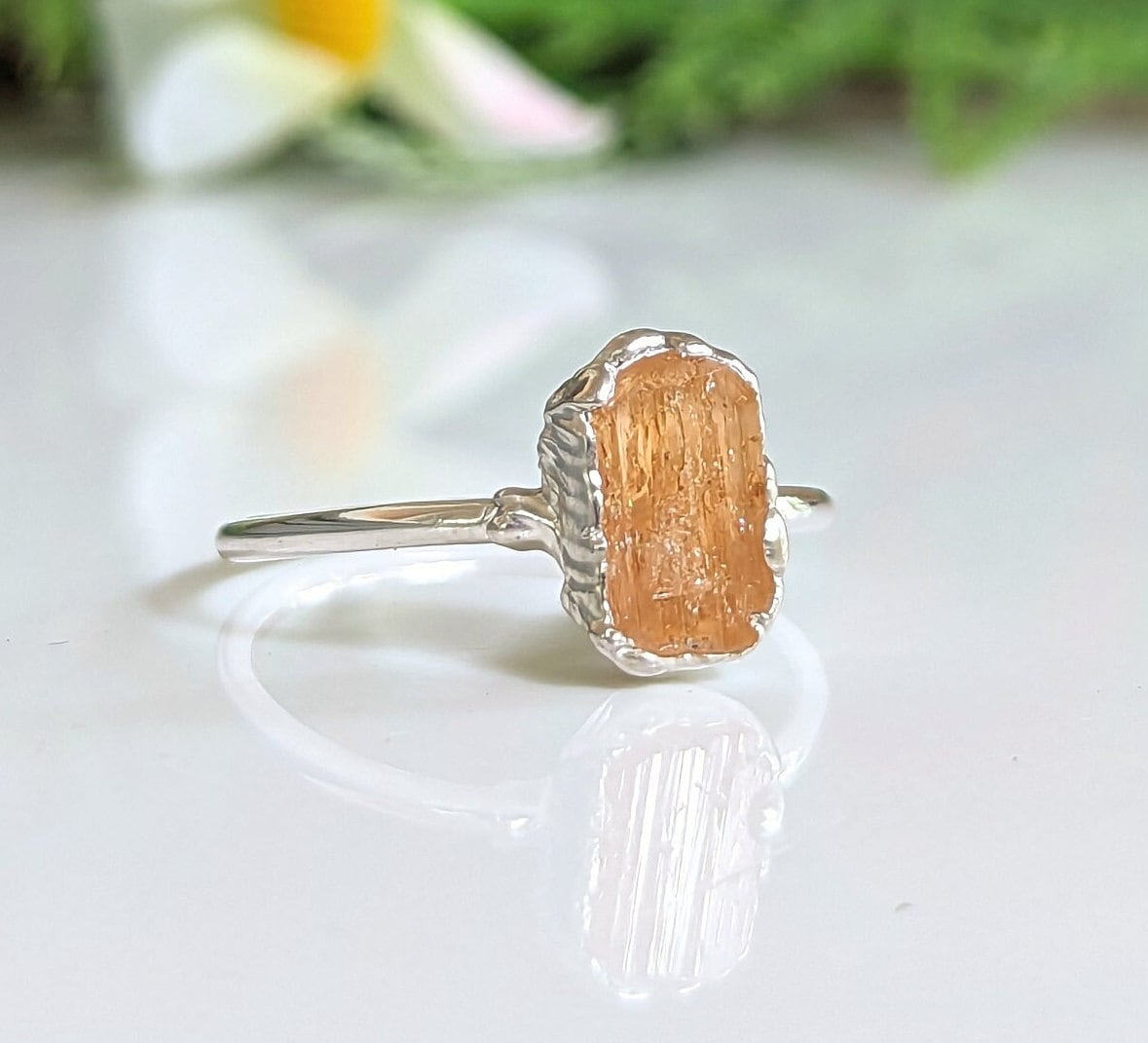 Handcrafted raw golden topaz ring on sterling silver band, perfect for special occasions or as a unique promise ring.