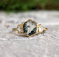 Moss Agate hexagon engagement ring with Herkimer diamonds on gold band, showcasing natural beauty and rustic elegance.