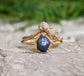 Raw Sapphire and diamond chevron ring set in 14k gold, perfect for nature-loving couples.