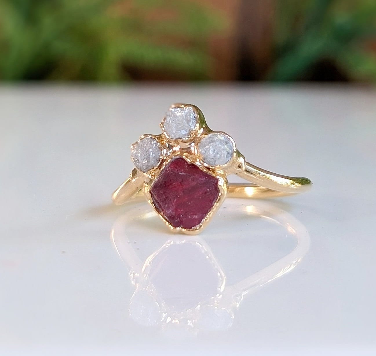 Raw diamond and pink spinel chevron engagement ring, handcrafted with unique design and ethically sourced materials.