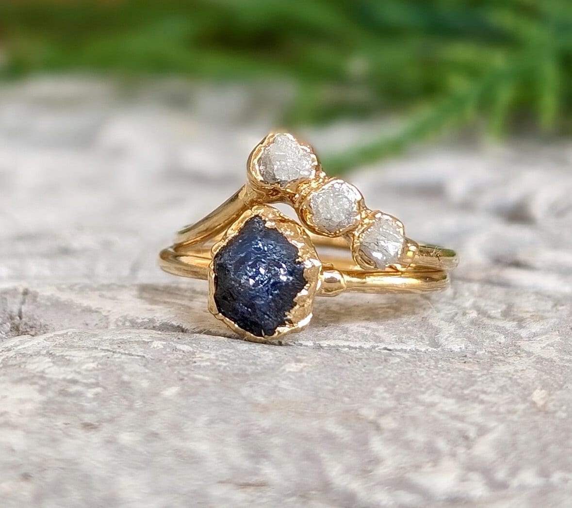 Raw sapphire wedding ring set with diamond chevron rings, handcrafted in solid 14k gold for a unique and rustic look.